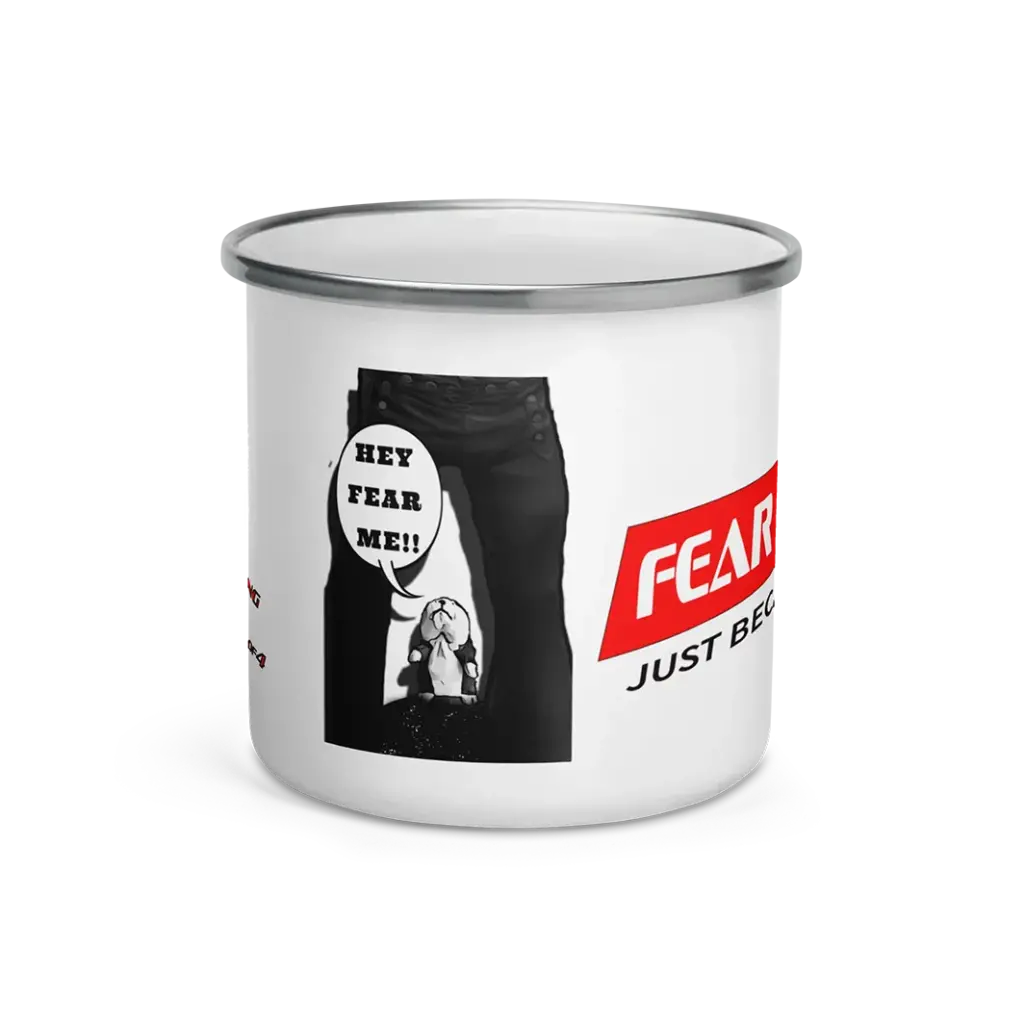 White enamel mug with "Fear Me Just Because" slogan and a comic collection 1 of 4 sketch graphic of the great feared hampster shouting fear me up form person's legs.